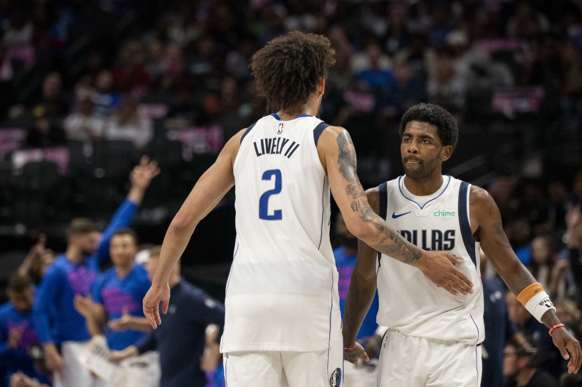 Dallas Mavericks rookie Dereck Lively II and superstar Kyrie Irving.